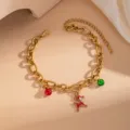Bracciale di Natale in acciaio inossidabile dorato con ciondoli renna smaltata e campanelli. - Stile Alce (0349)