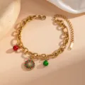Christmas stainless steel enamel charm bracelet with red green bells and candy pendant detail. - Peppermint Style (0353)
