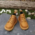 Close-up view of tan children's Martin boots with side zippers and non-slip rubber soles - Size 21 (14cm) / Yellow Brown