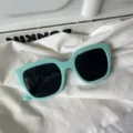 Schicke quadratische Sonnenbrille in Mintgrün mit dunklen Gläsern, modisch für Damen. - Grün Großes Quadrat
