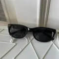 Schicke schwarze Sonnenbrille mit Perlen-Anhänger, trendiges Design für Damen und Herren. - Planeten-Katzenaugen-Stil (Mit Wassertropfen-Perlenanhänger)