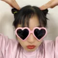 Pink heart-shaped sunglasses, cute novelty party eye wear for photo props and festival dress up. - Pink Heart