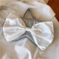Grey silk sleep mask featuring a large white satin bow and delicate pearls for comfortable rest. - Light Gray