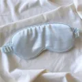 Light blue silk sleep mask for comfortable night resting, soft breathable shading eye cover. - Mercerized Blue