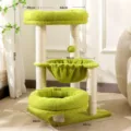 Multi-tier cat tree with cozy green fleece beds, hanging basket, and durable sisal scratching posts. - Dian Green