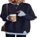 Detailed view of the women's double-layer fake two-piece knitted sweater in deep blue. - S / Sapphire Blue