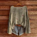 Detailed view of the casual floral knit sweater with long sleeves and loose fit design. - S / Color 845