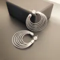 Boucles d'oreilles créoles torsadées multibrins argentées pour femmes, bijou élégant. - Argent