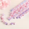 Cherry blossom origami star paper strips in pink and purple with folded lucky stars. - Sakura Romance / 520 Sheets/Pack
