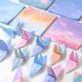 Quadratisches Origami Papier mit wunderschönem Himmelsverlauf für kreative Bastelprojekte. - Himmelsstadt / 200 Stück