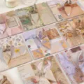Vintage Origami Papier Set mit bunten handgemachten Kranichen für kreatives Basteln und DIY Kunst. - Nostalgie Geschichte B / 200 Stück