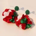 Detailed view of handmade red and green fabric flower ball earrings with green beads - 红色款(E-1869)