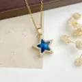 Squisita collana in acciaio inox con ciondolo a stella blu scintillante in zircone. - Blu Scuro (XL1200-300)