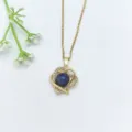 Collana con ciondolo a cuore dorato con zirconi microincastonati e pietra d'umore termosensibile. - Cuore Strass (XL2606-154)