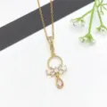 Squisita collana con ciondolo in zircone placcato oro con elegante fiocco e goccia per donna. - Stile Fiocco Goccia d'Acqua (XL2607-141)