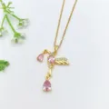 Squisita collana con ciondolo a colibrì dorato in rame con zirconi rosa brillanti. - Stile Colibrì (XL1200-341)