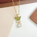 Collana in acciaio inox dorato con ciondolo a fiore in zircone verde e bianco elegante. - Stile Foglia di Pianta e Goccia (XL1200-391) / Oro