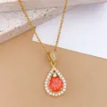 Squisita collana con pendente a goccia con zirconi arancioni brillanti e catenina dorata fine. - Zirconia Arancione (XL1200-320)