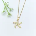 Dettaglio ciondolo stella marina oro, delicata catenella per clavicola in zirconia microincastonata. - Collana Combo Stella Marina Coda di Pesce (XL2606-074)