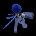 Set portachiavi di sicurezza da 7 pezzi blu per donna con ponpon e porta flacone. - Stella blu