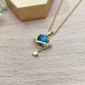 Elegante collana con ciondolo pianeta cielo stellato con catena dorata e cristallo. - Catena a Croce Oro (XL1992-57)