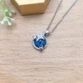 Collana con ciondolo a stella in acciaio inox, dettaglio design cielo stellato blu con zirconi. - Catena a Croce Color Acciaio (XL1992-103)