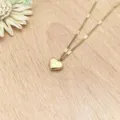 Stainless steel gold heart pendant necklace detail shot, elegant geometric chain link accessory. - XL1338-19 Gold Color