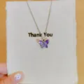 Collana con ciondolo a farfalla variante con zirconi cubici scintillanti design elegante. - Farfalla Viola (XL2112-10) / Viola