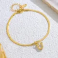 Goldfarbene Edelstahl Schlangenkette Fußkette mit U-Anhänger und K18 Plakette Damen. - Buchstabe U