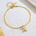 Goldene Edelstahl Buchstaben X Schlangenkette Fußkettchen Detail, elegante Damenschmuck. - Buchstabe X