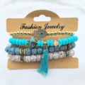 Σετ πολυεπίπεδων βραχιόλι με χάντρες boho με μενταγιόν χεριού Hamsa και φούντα για γυναίκες. - Μπεζ Αγγλικά