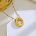 Detail view of a gold-plated stainless steel ring pendant necklace with textured design. - Gold-Letter O