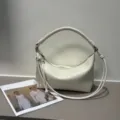 White leather shoulder bag with braided handle and soft pleated design for women stylish daily use. - Blank / Off White