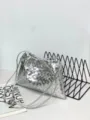 Detail shot of silver woven leather pouch bag showing intrecciato texture and drawstring closure. - 32*21*1cm / Silver