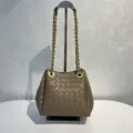 Sac seau en cuir tressé marron avec chaîne en métal, sac à bandoulière élégant pour femmes. - Brun Pignon