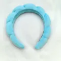 Close-up of fluffy blue cloud headband, soft velvet material, ideal for daily makeup and face washing. - Twisted Sponge Headband / Blue