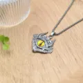 Gothic demon eye skull pendant necklace detailed view showcasing intricate metal carving and yellow eye. - XL1810-183 Yellow Evil Eye