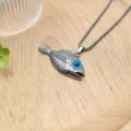 Silver evil eye fish skeleton pendant necklace detail, retro punk style jewelry accessory. - XL1810-231 Fishbone