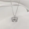 Kollie me kremasto se schima filigrano me lamperous zirkonia krystalla gia gynaikes. - XL1470-82