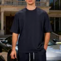 Detail shot of men's casual dark blue oversized jacquard knit short sleeve t-shirt - S / Tops / Navy Blue