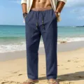 Casual beach linen trousers detail shot, showing ethnic style drawstring waist and relaxed fit. - S / Bottoms / Navy Blue