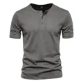 Detailed view of men's short sleeve breathable mesh Henley shirt with button placket in grey. - Dark Gray