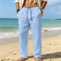 Mens casual loose linen beach trousers with ethnic drawstring waistband in light blue color. - Light Blue