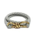Graues geflochtenes Lederband mit goldenem Knoten-Metallverschluss, edles Accessoire. - Achatgrau