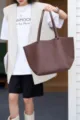 Stylish genuine leather brown tote bag for women, large capacity commute shoulder bag. - Ebony