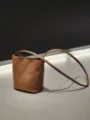 Minimalist brown leather bucket bag for women, featuring a slim strap and casual design. - 16*11*18cm / Brown
