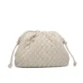 Woven leather pouch bag detail showcasing the soft pleated texture and intricate craftsmanship. - Off White