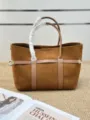 Brown suede tote bag for women, luxury style leather shoulder bag with stylish belt design. - Blank / Caramel color