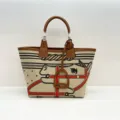 Canvas and leather tote bag featuring a stylish horse graphic and sturdy top handles for daily use. - Horse Pattern and Brown