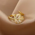 Macro view of 18K gold plated monstera leaf ring with sparkling zircons on silk background. - Adjustable Open / Hollow Monstera Leaf Style (ESF383#) / Gold